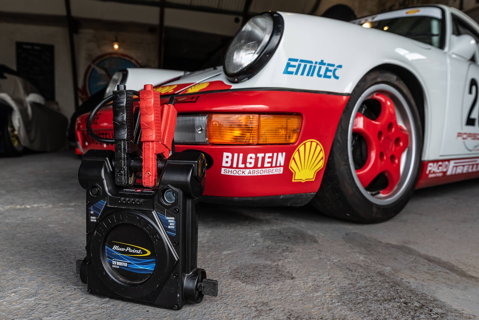 Prestige car in storage receiving a trickle charge